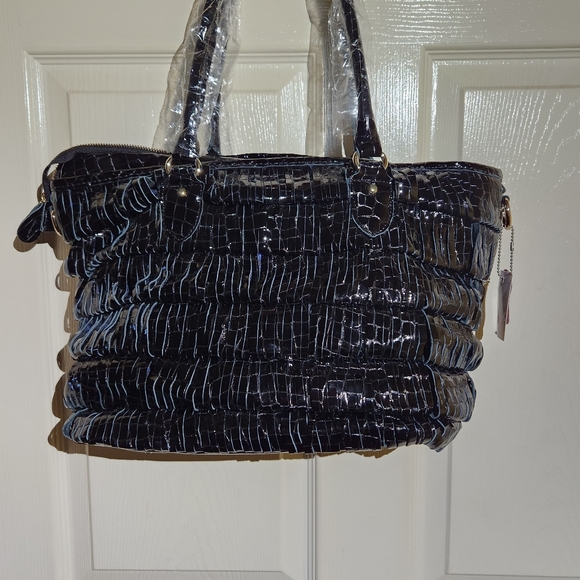 Chaos black leather slit pattern purse optional crossbody strap. NWT - Picture 3 of 10
